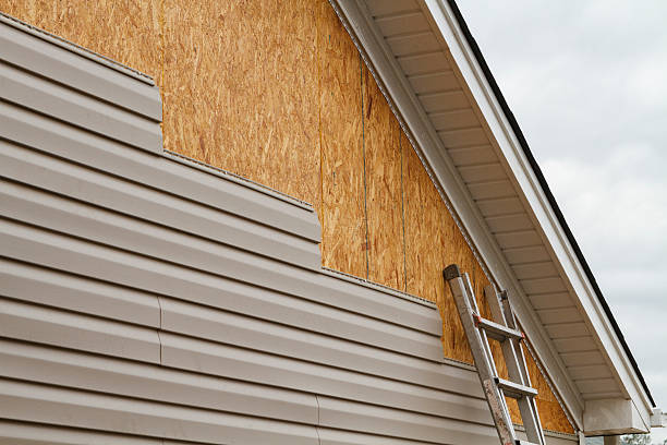 Professional Siding Replacement technician working in Perkasie, PA